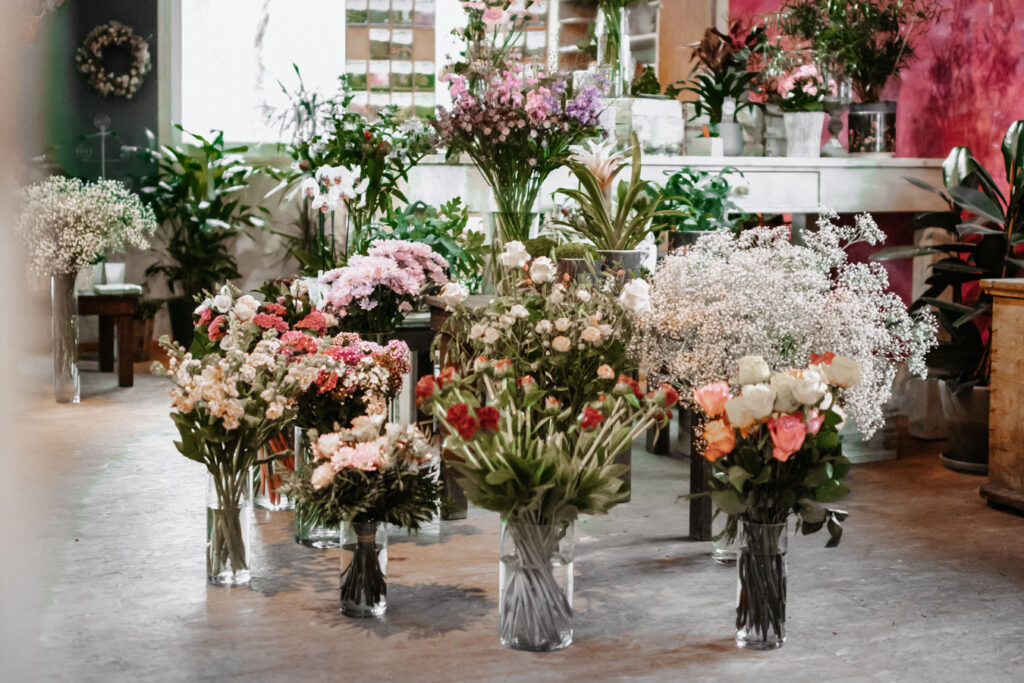 Different types of flowers in vases.